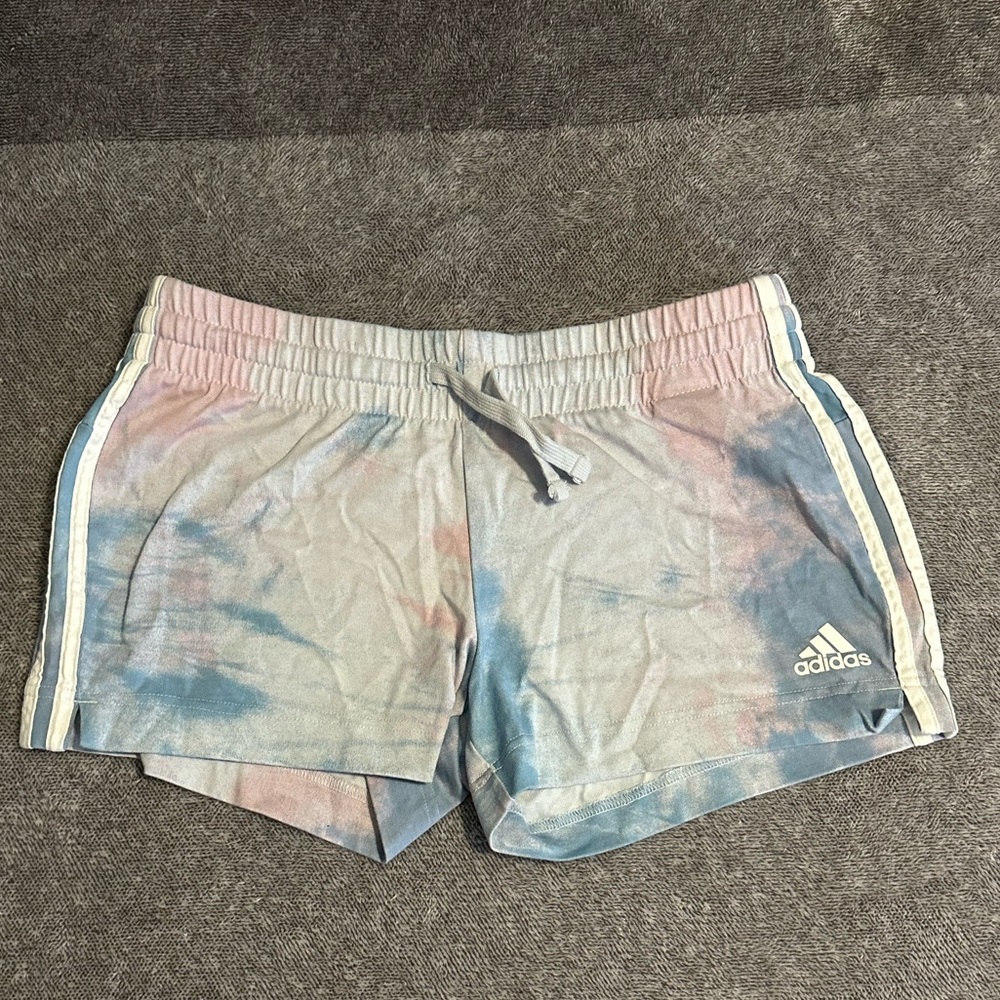 Adidas blue and pink tie dye shorts.